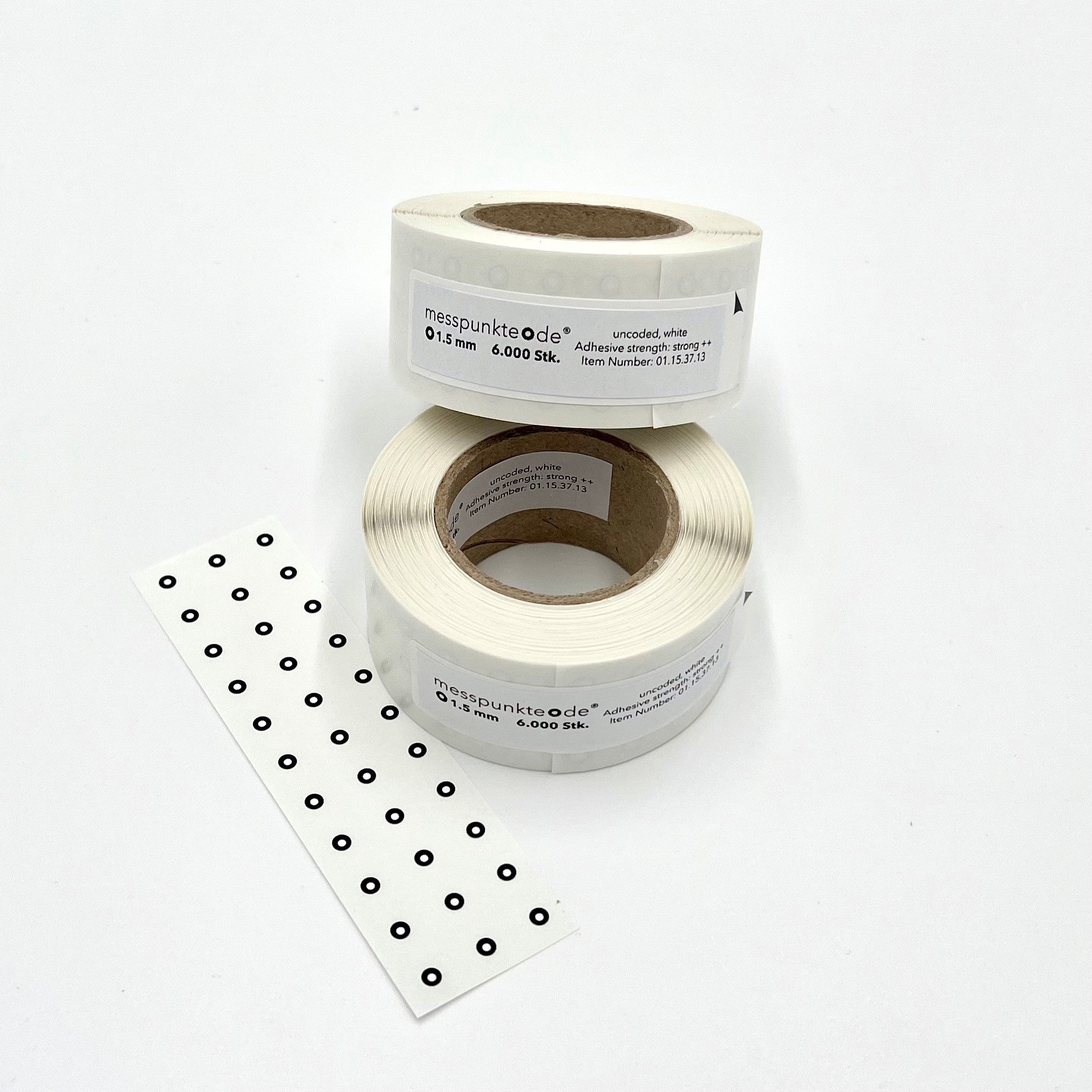 ST 015 6000 STRONG - Standard White/Black Targets - 1.5 mm Diameter - Strong Adhesive - 6000 per Roll